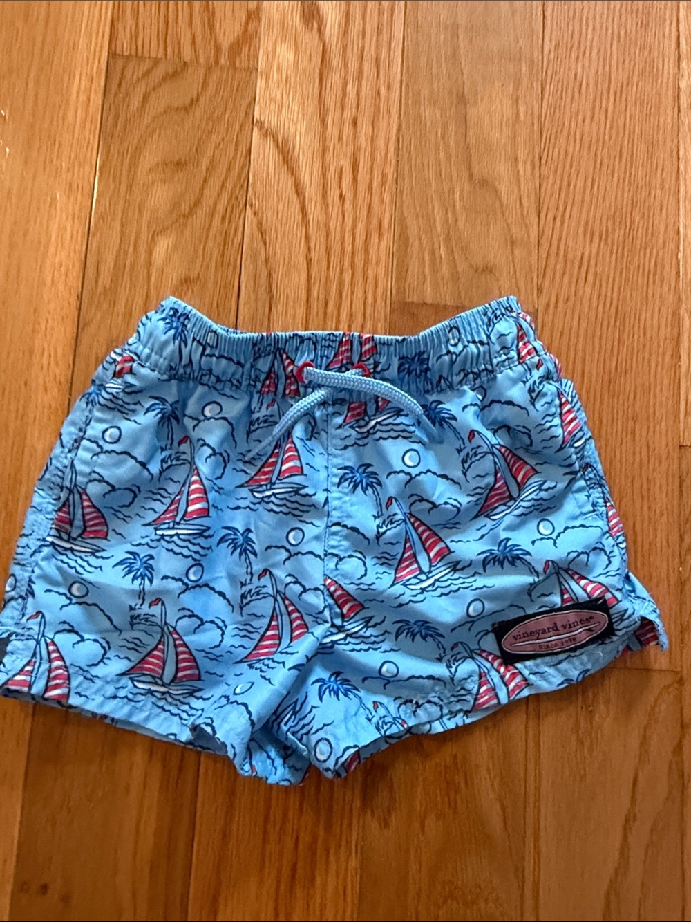 Vineyard Vines Blue Swim Shorts with Red Sailboat Print 12-18 months
